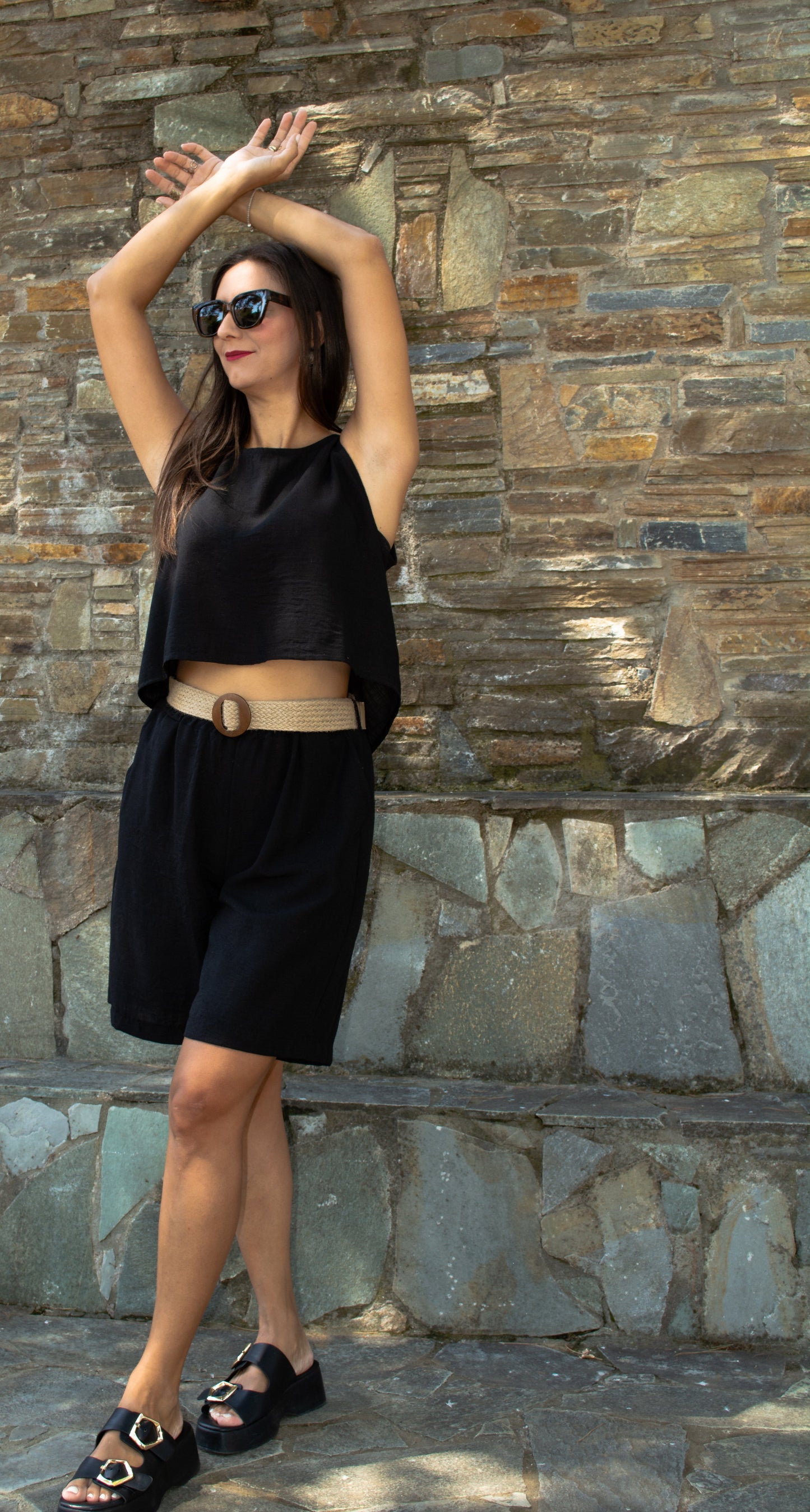 Women's belted shorts in lightweight fabric — relaxed fit with structured waist for effortless style.