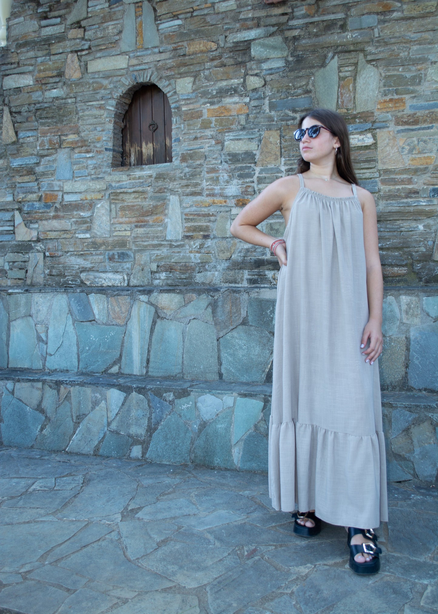 Women's long dress in lightweight fabric with minimal design — flowing silhouette and effortless elegance.