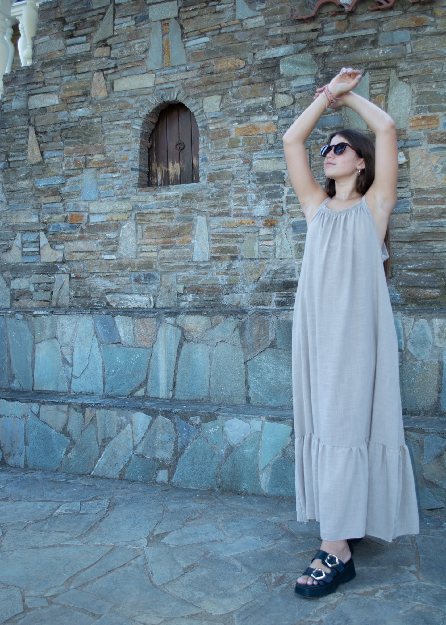 Women's long dress in lightweight fabric with minimal design — flowing silhouette and effortless elegance.