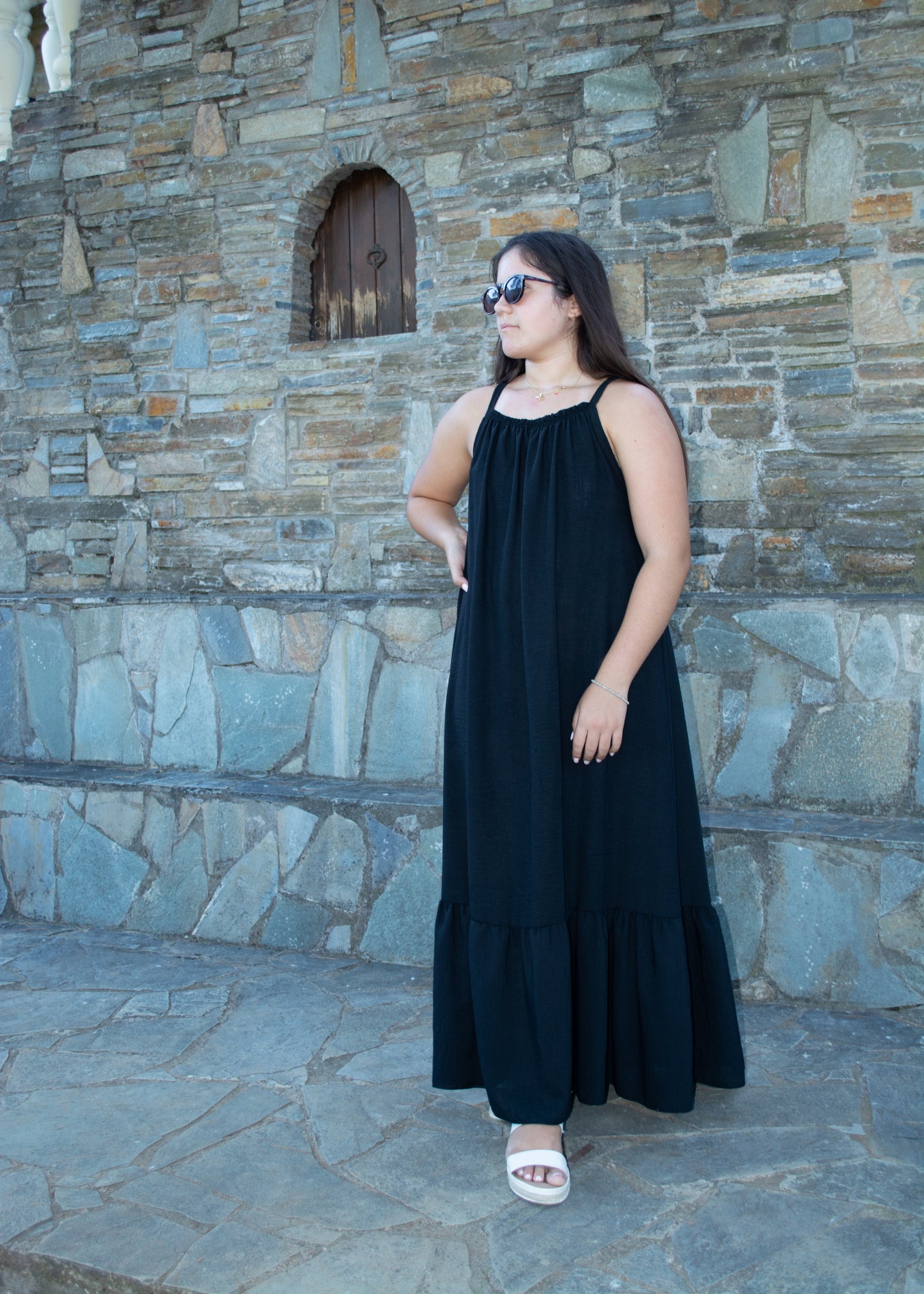Women's long dress in lightweight fabric with minimal design — flowing silhouette and effortless elegance.