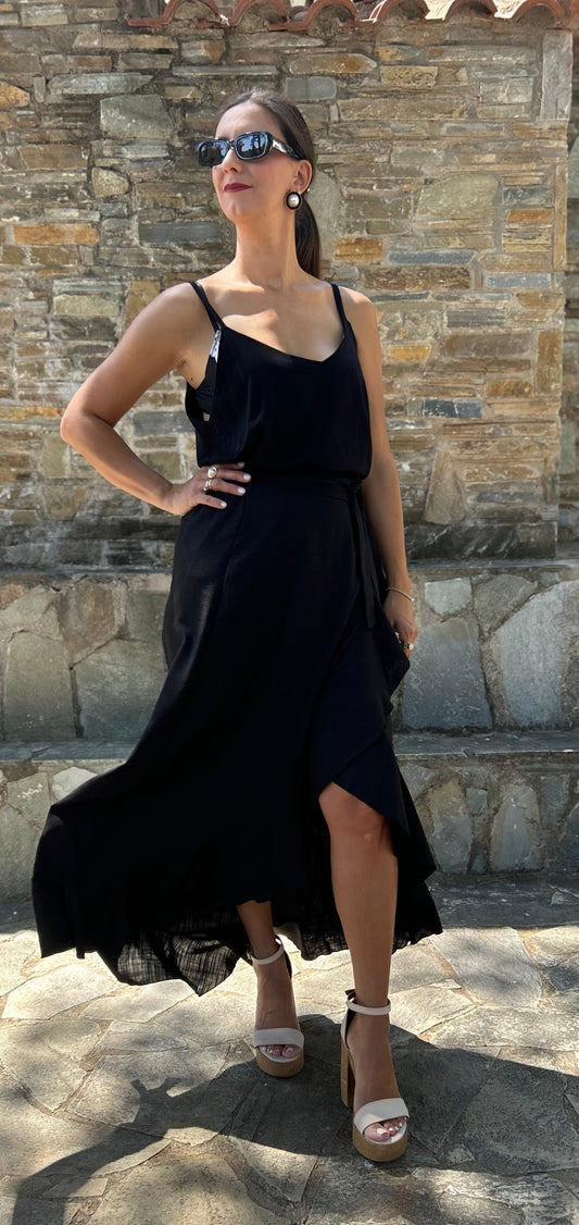 Women's black skirt with side slit and artistic detailing — elegant, feminine, and designed to turn heads.