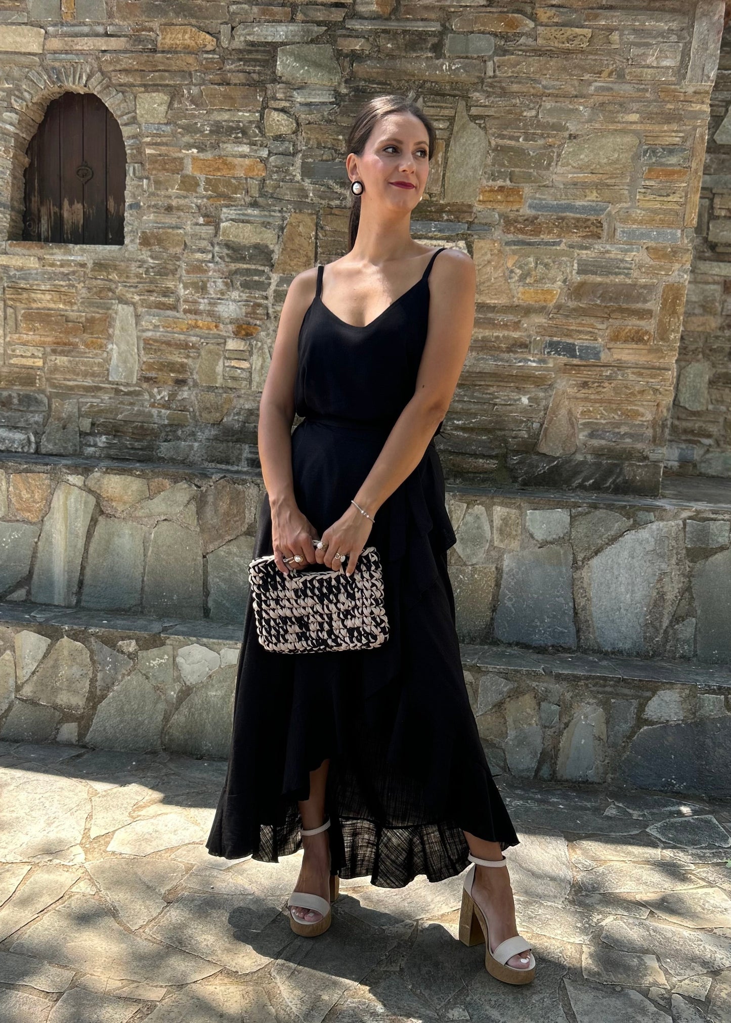 Women's black skirt with side slit and artistic detailing — elegant, feminine, and designed to turn heads.