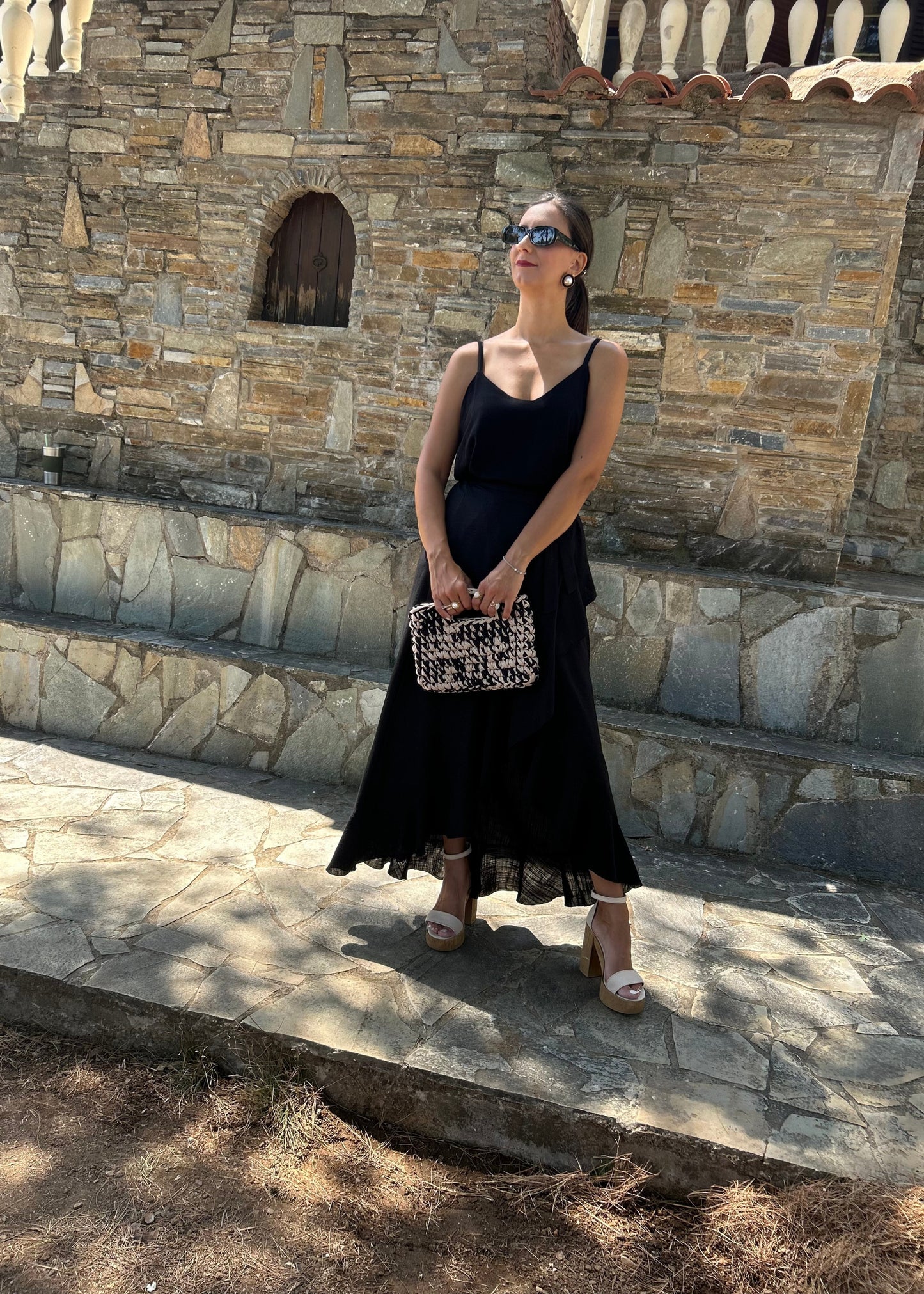 Women's black skirt with side slit and artistic detailing — elegant, feminine, and designed to turn heads.