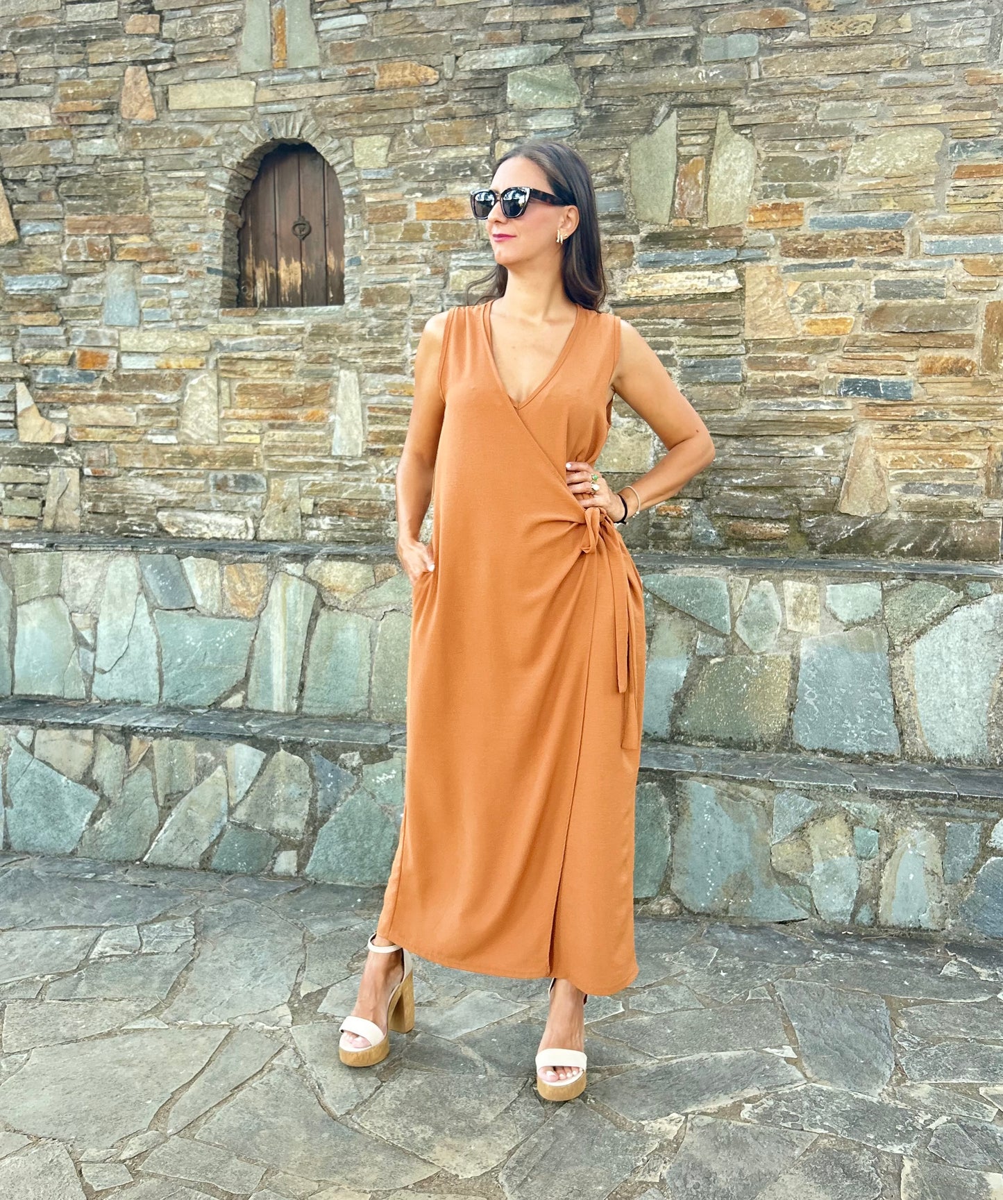 Women's one-size jumpsuit in earthy tones, featuring a relaxed fit and lightweight fabric for effortless elegance.