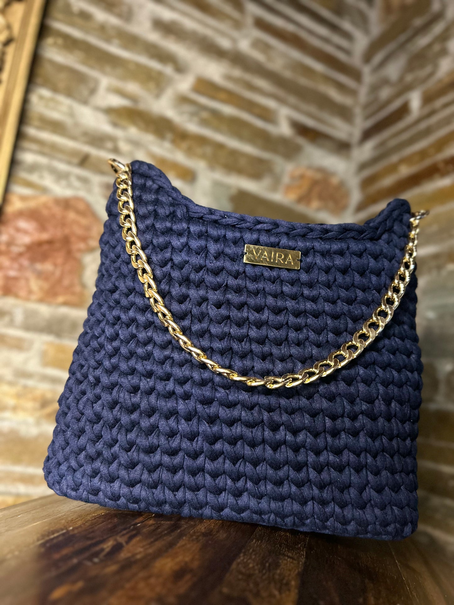 Handmade navy blue rectangular crochet shoulder bag, lined interior, youthful and modern design