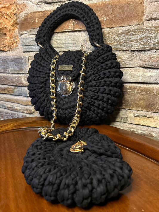 Handmade round black crochet shoulder bag with matching wallet, featuring a metal and thread strap.