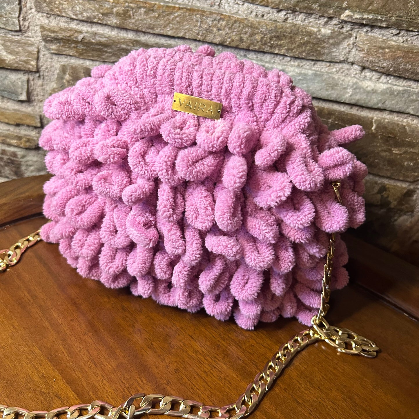 Puffy Bag Soft, plush, and handmade with love. Crafted with eco-friendly velvet yarn and a striking 3D loop stitch, this bag is a true fashion statement.
Available in 3 sizes & a range of stunning shades. Features a metal clasp frame for secure closure. Fully lined interior for both function and finesse.