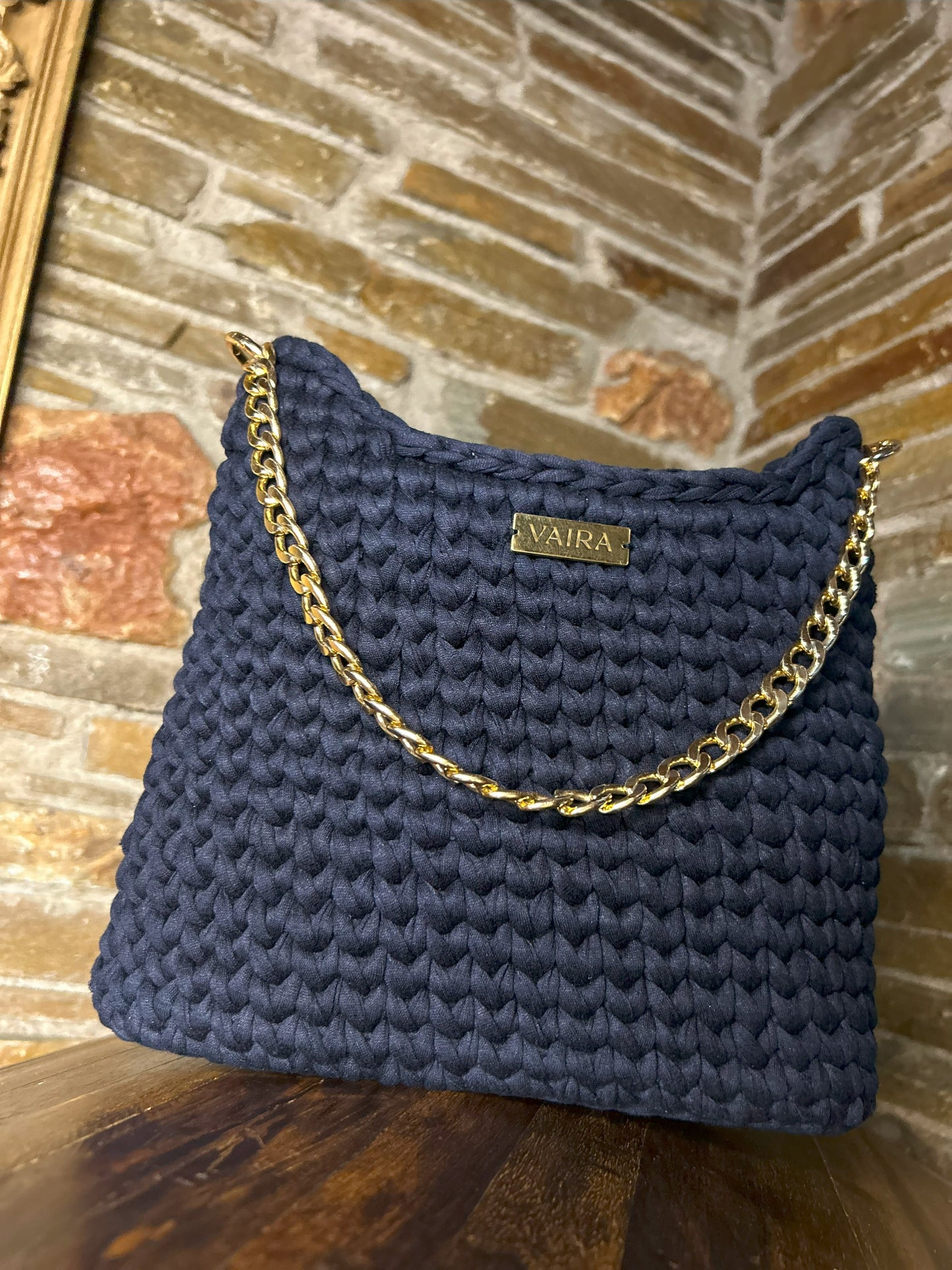 Handmade navy blue crochet shoulder bag, lined interior, youthful and modern design