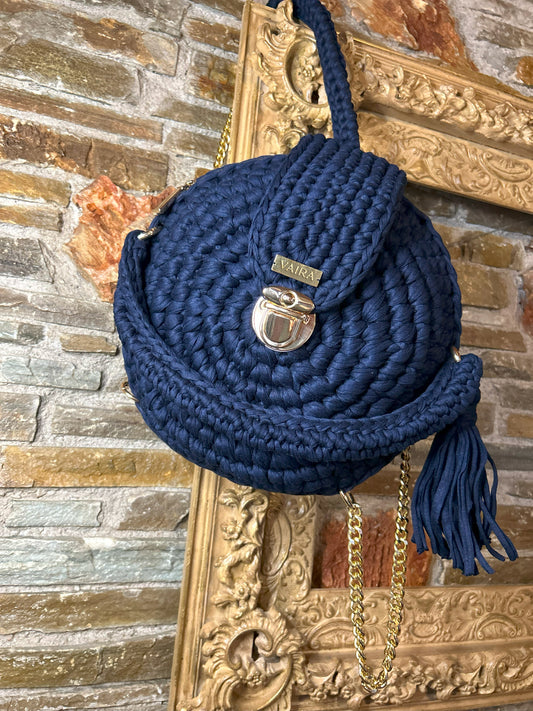 Handmade round blue crochet shoulder bag with matching wallet, featuring a metal and thread strap.