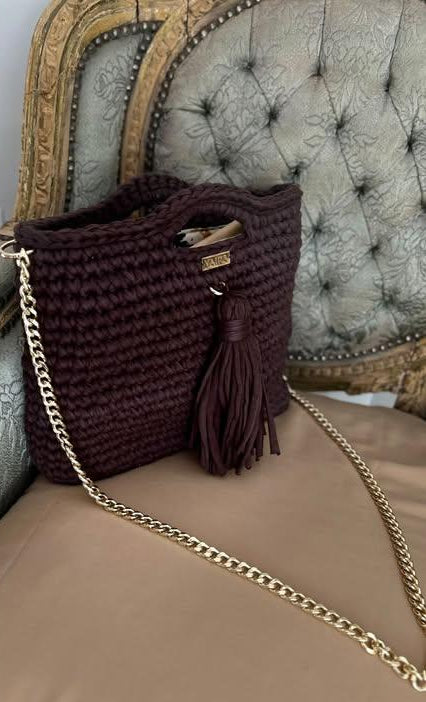 Handcrafted crochet handbag in vibrant hues, blending romance and modern femininity. One-of-a-kind piece — perfect for everyday denim looks with a touch of handmade charm. Optional chain turns it into a chic shoulder bag.