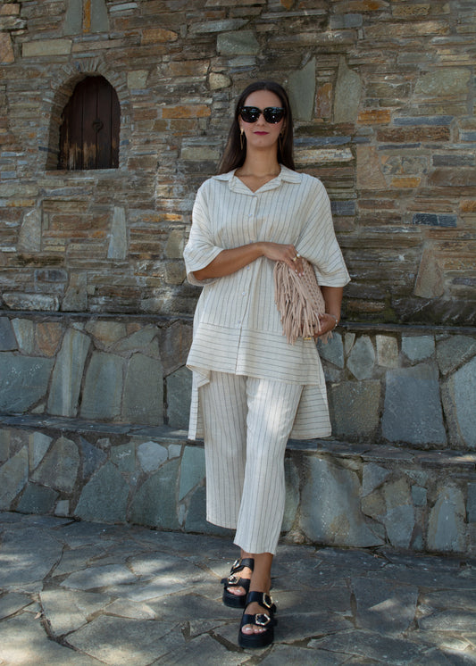 Women's oversized white striped shirt and pants — relaxed fit with clean lines and timeless minimal style