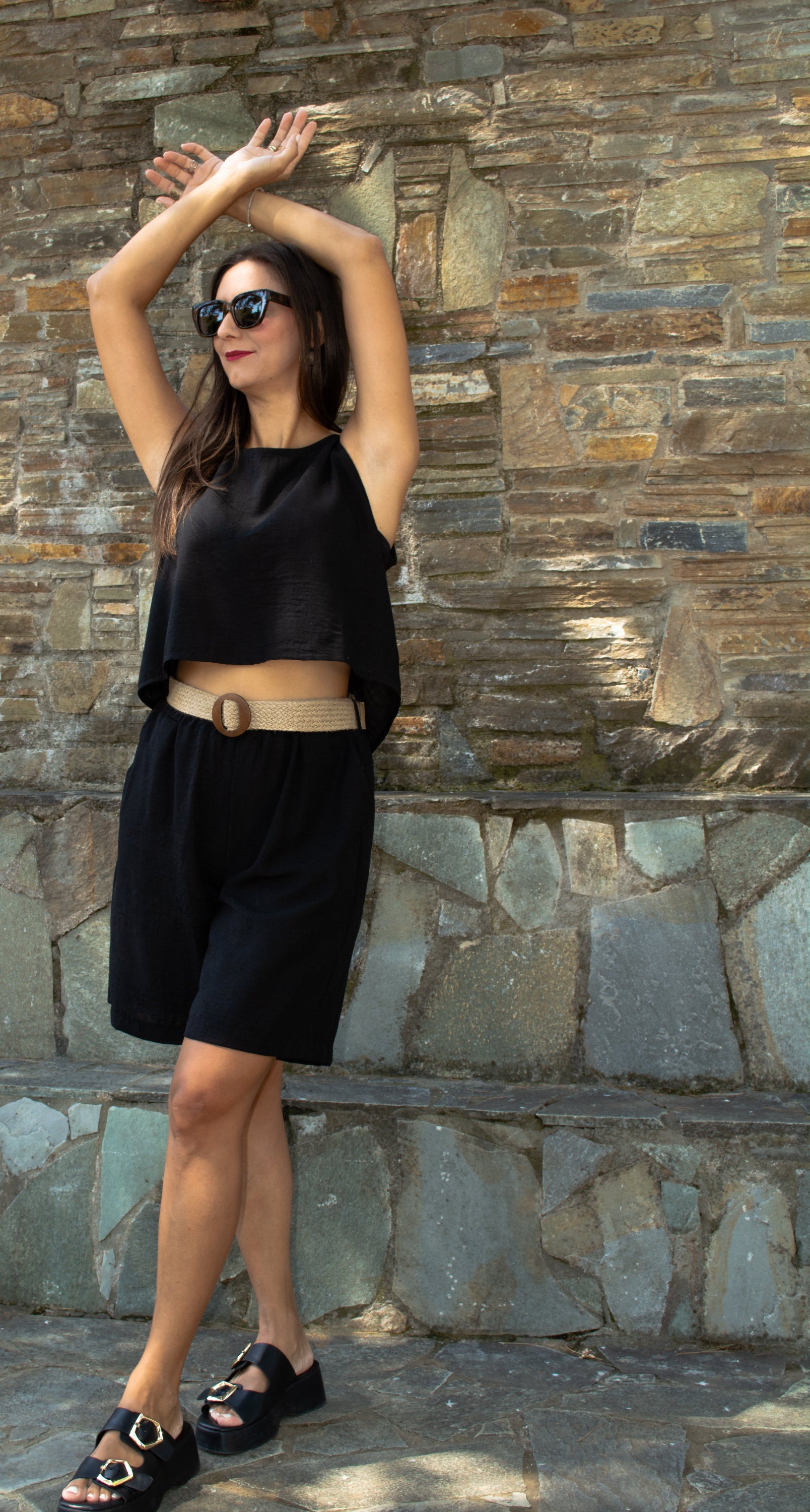Women's belted shorts in lightweight fabric — relaxed fit with structured waist for effortless style.
