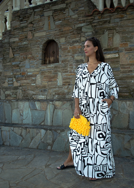 Women's one-size geometric print dress with side slit, featuring a relaxed silhouette and lightweight fabric.