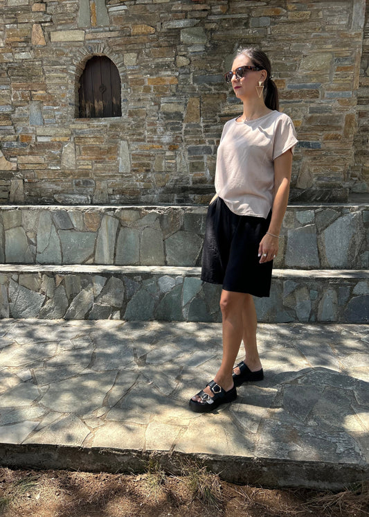 Women top with back button detail — lightweight fabric and clean lines for modern everyday style