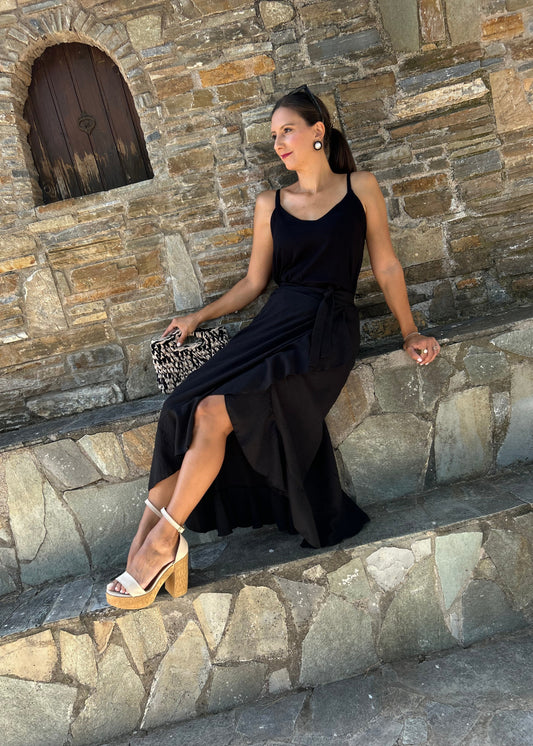 Women's black skirt with side slit and artistic detailing — elegant, feminine, and designed to turn heads.
