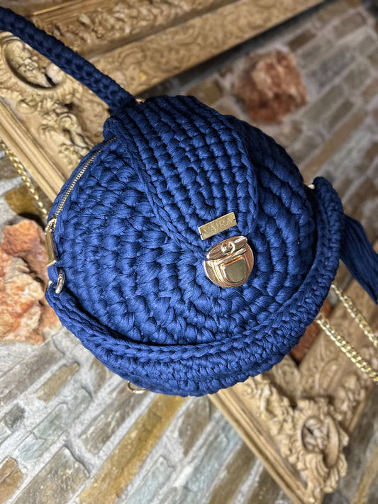 Handmade round blue crochet shoulder bag with matching wallet, featuring a metal and thread strap.