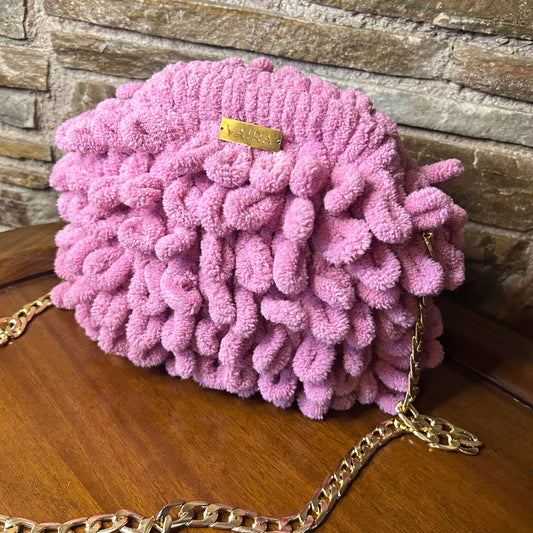 Puffy Bag Soft, plush, and handmade with love. Crafted with eco-friendly velvet yarn and a striking 3D loop stitch, this bag is a true fashion statement.
Available in 3 sizes & a range of stunning shades. Features a metal clasp frame for secure closure. Fully lined interior for both function and finesse.