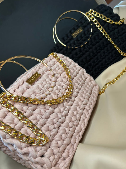 Handmade crochet shoulder bag made of 100% cotton yarn, featuring a refined woven texture, elegant inner lining, gold-tone metal handles, and a detachable gold chain for versatile styling — shoulder, crossbody, or handheld.