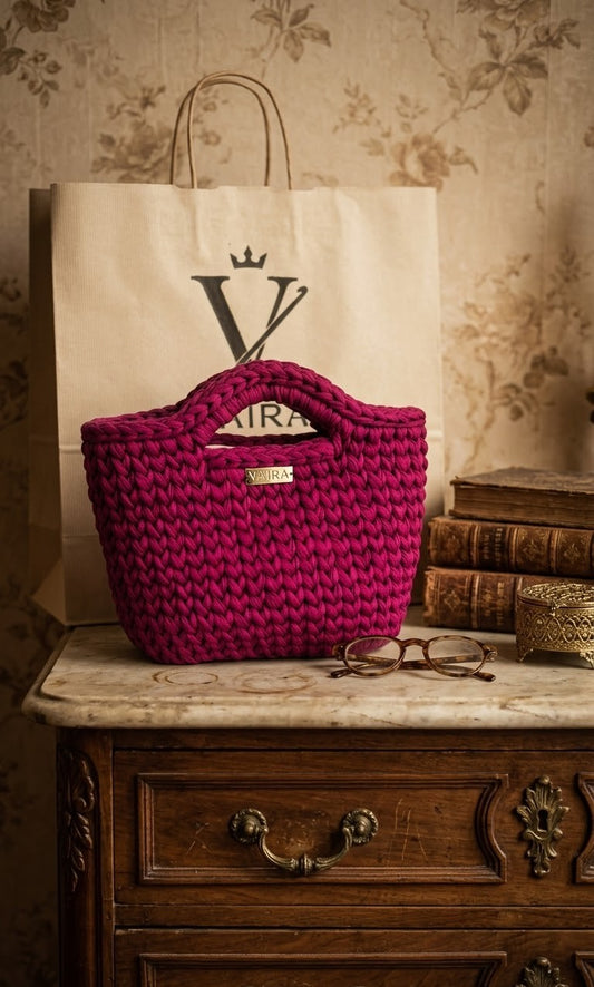 Handcrafted crochet shoulder bag in rich, passionate tones, featuring a textured weave, optional gold chain strap, and elegant design. Lightweight, medium-sized, water-repellent, and made in Greece with attention to detail.